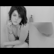 An attractive girl is captured on video from two different perspectives in a dual-camera, picture-in-picture video format as she shits into a bathtub. About 5.5 minutes.
